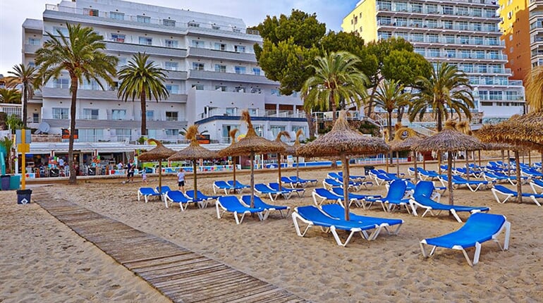 Hotel Flamboyan-Caribe: fotografie vybavení exteriérů a interiérů ubytování.