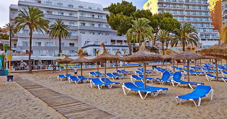 Hotel Flamboyan-Caribe: fotografie vybavení exteriérů a interiérů ubytování.