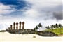 Seven moais standing on the Anakena Beach in Easter Island facing inland_shutterstock_1185318101