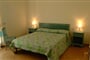 Ložnice apartmánu BILO, San Teodoro, Sardinie