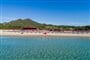Hotelová pláž s barem, Castiadas, Sardinie