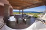 Vila GLI OLIVASTRI - veranda s houpací sítí, Isola Rossa, Sardinie, Itálie